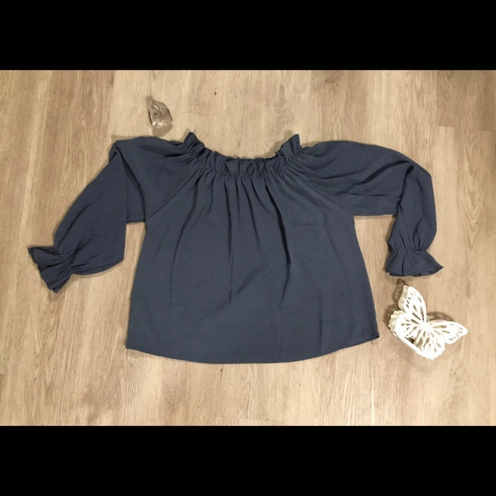 Off the shoulder ruffle trim blouse